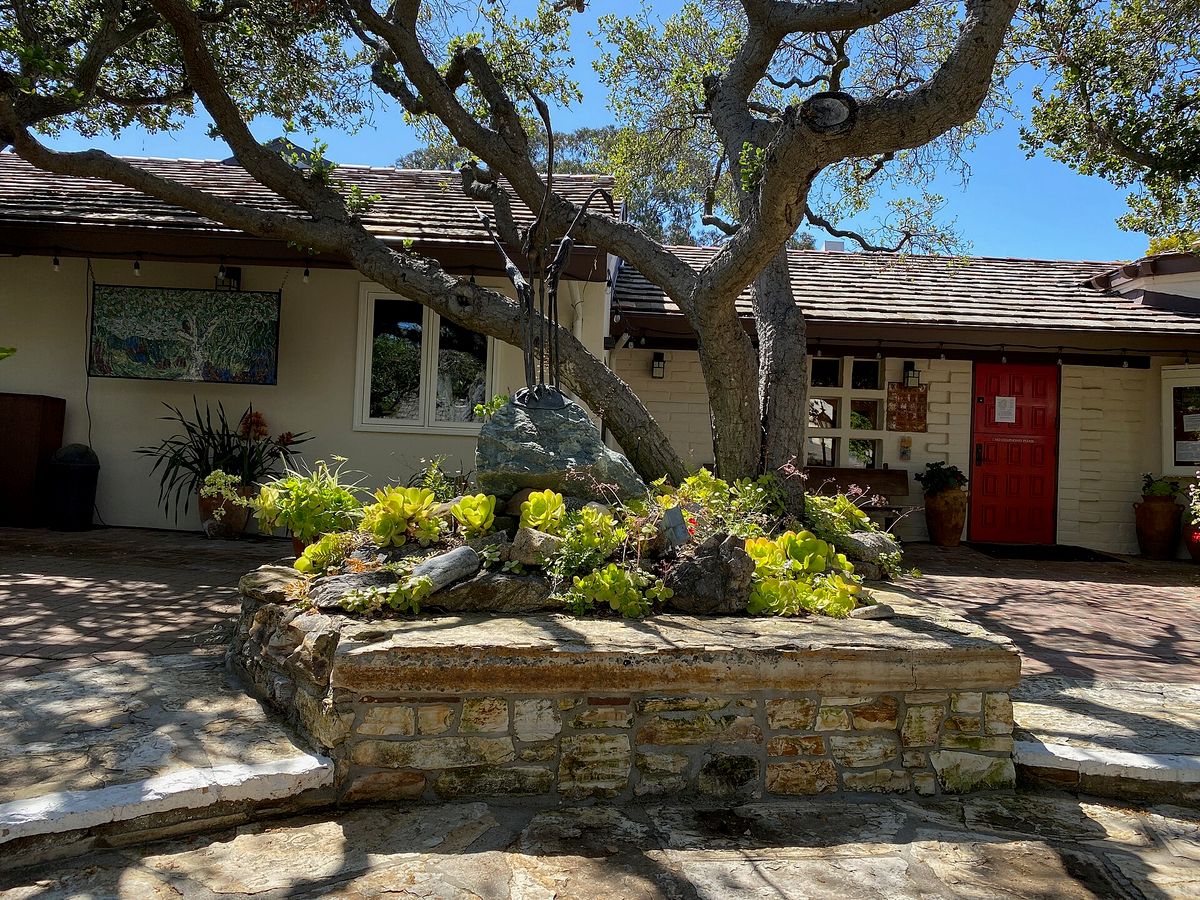 The front patio of the Carmel Art Association under an old oak